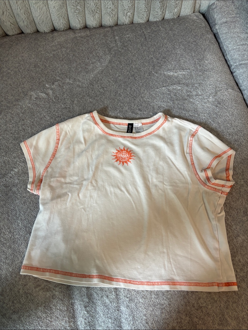 White & Coral Contrast Stitch Baby Tee with Sun Graphic